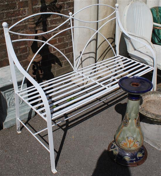 White painted metal garden bench